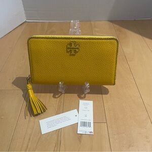 Tory Burch Pebbled Leather Zip Wallet in Yellow with Tassel
